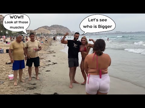 Female Bodybuilder surrounded by fans at the Beach 🏝️